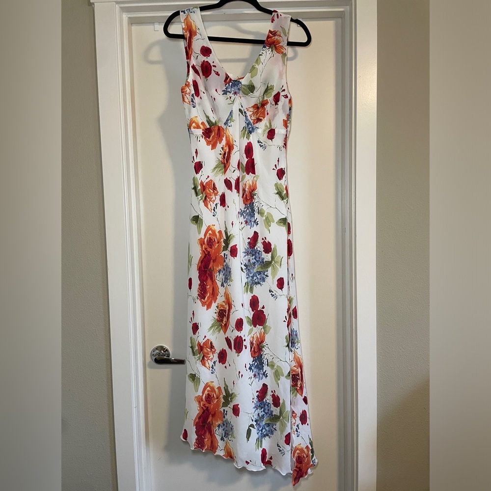 Tribal. Floral Asymmetrical Midi Floral Size 10 
100% POLYESTER Spring Summer